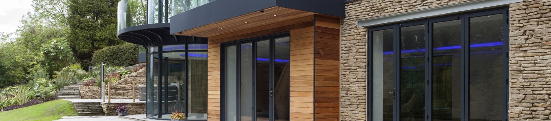 house with curved aluminium windows and doors